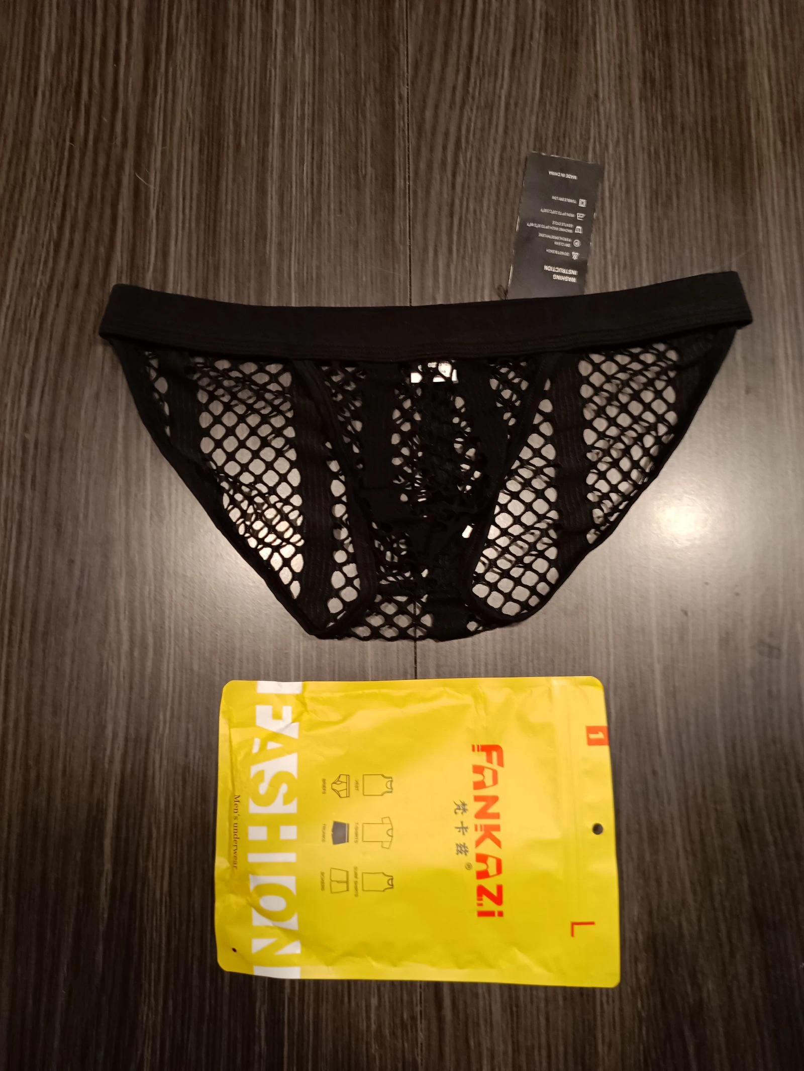 Slip ajouré noir homme